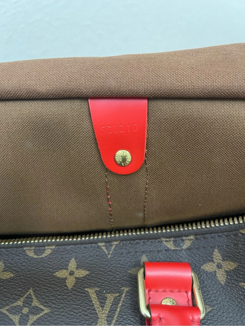 LOUIS VUITTON Keepall Bandoulière 50 Coquelicot Red Monogram Canvas Travel Bag